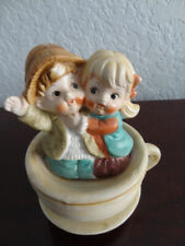 Musical Cup & Saucer with Boy and Girl inside  Plays  