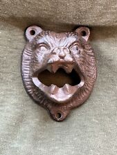 Very cool, rustic wall-mounted Bear bottle opener.  3.5 inches top to bottom. picture