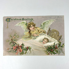 Postcard Christmas Greetings Tucks Embossed Angel Tucking In Baby Holly 1910 picture