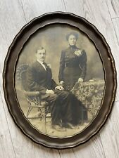 Antique Sepia Man & Woman Portrait In Decorative Oval Brown & Gold Lined Frame picture