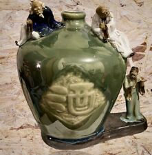 Rare Shiwan Chinese glazed pottery vase with three mud men. (Star Gods) picture
