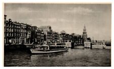 Montelbaanstoren a tower on the banks of a canal in Amsterdam RPPC Postcard  picture