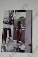 candid curvy brunette woman looking out window   Vintage  Photograph at picture