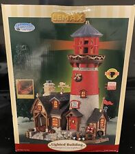 Pre-Owned Lemax Lighted “Fisherman’s Cove Lighthouse”. picture