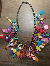 Vintage 1980s Plastic Clip On Bell Charm Necklace With Mixed Charms picture