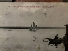 A Pleasant party Torch Lake 1909 Boat Sailboat Boathouse. Awesome Bw RPPC picture