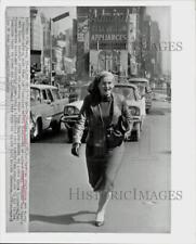 1960 Press Photo Dr. Barbara Moore strolls through New York's Times Square picture