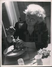 1948 Press Photo Mrs Viola Westwood painting a figurine picture