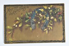 Vintage 1910 Merry May Thy Christmas Be Horseshoe Holly Berry w Glitter Postcard picture