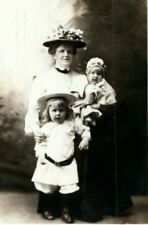 1909 Woman with Two Children Chicago Illinois IL Posted RPPC Photo Postcard picture