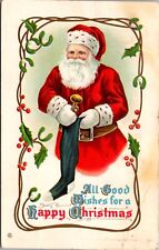Happy Christmas Postcard Santa Claus Putting Trumpet Into a Stocking picture