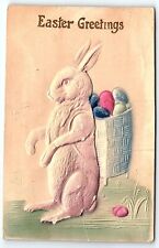 1914 EASTER GREETINGS BUNNY RABBIT BASKET OF EGGS HEAVY EMBOSSED POSTCARD P3259 picture