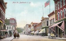 Main Street Fishel's Bazaar Bodega in Deadwood SD 1911 RPO picture