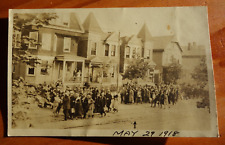 May 29, 1918 large groups walking past reverse-image homes postcard rppc picture