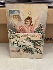 Vtg Postcard Embossed A Merry Christmas Angel Over Pine Branches Tuck’s  picture