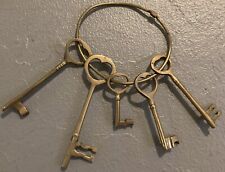Vintage Large Set of 5 Decorative Brass Skeleton Keys On A Large Ring picture