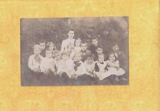 X RPPC real photo postcard TEACHER WITH HER YOUNGER STUDENTS ? GROUP PHOTO  picture