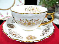 COALPORT tea cup and saucer gold gilt cameo  teacup England 1930s Embossed picture