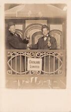 VINTAGE RPPC 2 GENTLEMEN POSE   DRINKING BEER   ON OVERLAND LIMITED TRAIN picture