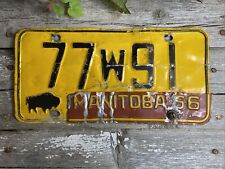 Vintage Manitoba Canada License Plate 77W91 with 1966 Tab picture