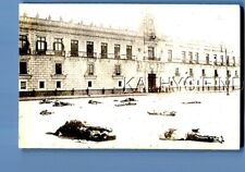 REAL PHOTO RPPC V+6066 BODIES LAYING IN FRONT OF THE PALACE IN MEXICO picture