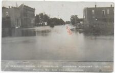 (6817) 1910 RPPC Stores in Flood  Downtown at  Oberlin Kansas   IT RAINED SOME picture
