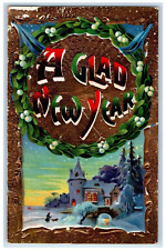 c1910's New Year Holly Wreath Winter Snow Gel Gold Gilt Embossed Postcard picture