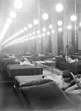 women lying in sofas facing a mirror in a brothel in Paris, France - Old Photo picture