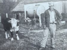 J3 Photograph Handsome Man Posing On Farm With Cow 1948 picture