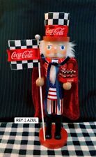 2024 Red COCA-COLA® Nutcracker Checkered 15” With Red Velvet Cape & Red Flag picture
