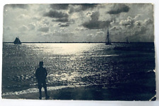 Man Looking at Moonlit Sea, Sailboats Vintage Postcard picture