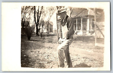 RPPC Vintage Postcard - A Man Digging soil at the Backyard - Real Photo picture