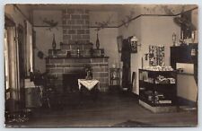 RPPC Red Brick Fireplace~Gift? Shop Interior~Rocking Chair~Oriental Hat~Vases PC picture
