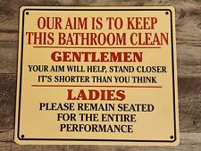 Ande Rooney Our Aim Is To Keep This Bathroom Clean Tin Sign picture