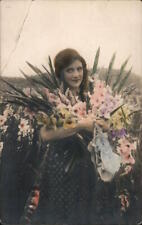 Women RPPC Tinted Photo: Woman with Colored Flowers Real Photo Post Card Vintage picture