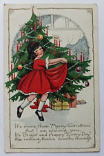Antique 1910s Christmas Tree Girl Red Dress Candles Gifts Embossed Postcard picture