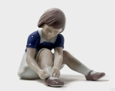 Vintage Denmark Porcelain Figurine Girl Fastening Shoes Hand Painted underglaze picture