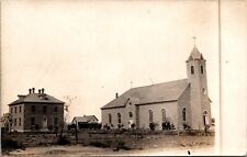 RPPC Church and Houses with Men Talking Outside c1910 Real Photo Postcard picture
