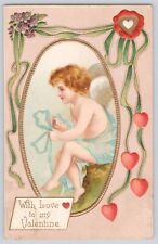 Postcard Valentine's Day Cupid Angel With Heart Ribbons Embossed 1908 picture