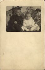 RPPC Kids on couch dazed look toy ball~ 1910 ESSIE ABEL to ELLA BUCK Goodhue MN picture