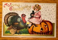 Antique Postcard Thanksgiving JOL Halloween Girl Sitting On Pumpkin Black Cat picture