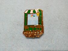 NBC Paris Summer Olympics Cafe Bistro Media Lapel Gold-Tone Pin NEW IN PACKAGING picture