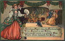 Christmas Elizabethan Scene Man and Woman Fireplace c1910 PC picture