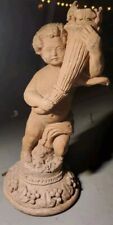 antique cherub statue picture