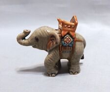 Miniature Porcelain Elephant with Basket Figurine picture