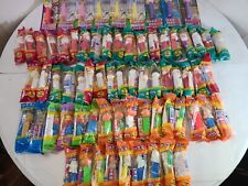 70 lot of PEZ Seasons, a Tin, Halloween, Easter, X-Mas, all Brand New and Sealed picture