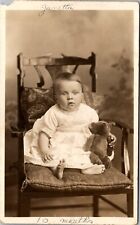 Real Photo Postcard 10 Month Old Baby Sitting In Chair with Teddy Bear picture