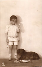Postcard RPPC Child Dropping Dinner Plate As Dog Watches picture