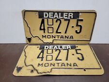 1984 Montana PAIR DEALER License Plate Tag original. picture
