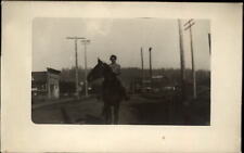 RPPC Woman on horse unknown town partial Peerless Tobacco sign 1904-20s postcard picture